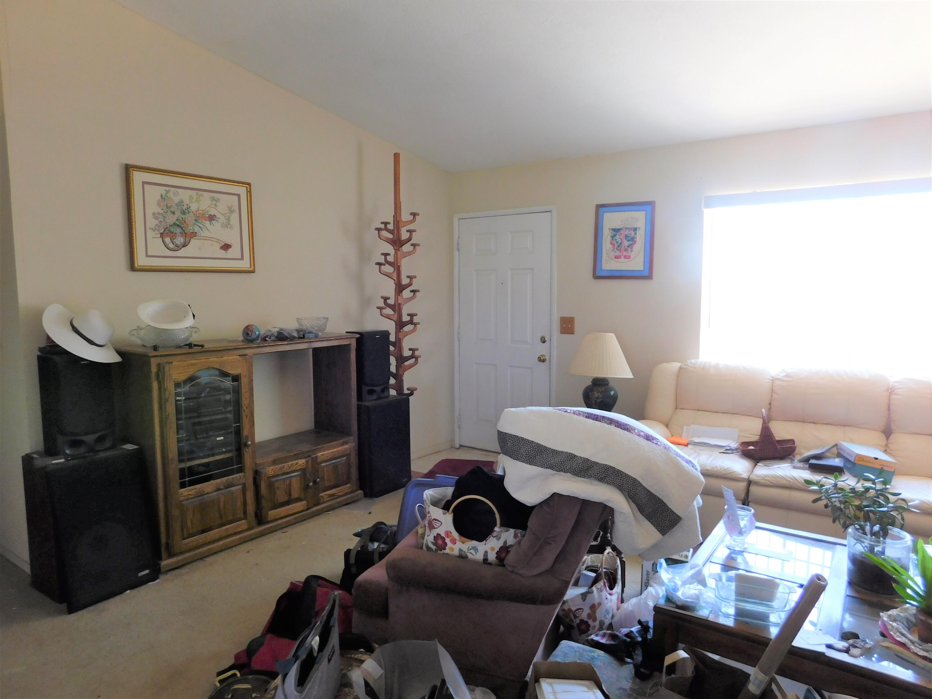 31601 Neuralia Road Mojave, CA 93519 - Photo 8 of 27 a bedroom with furniture and a closet