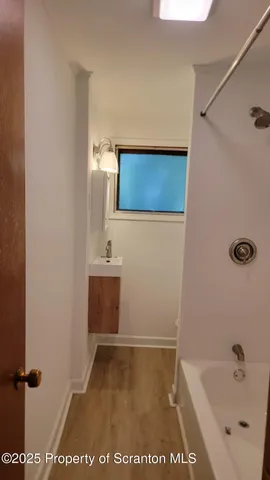 a bathroom with a bathtub