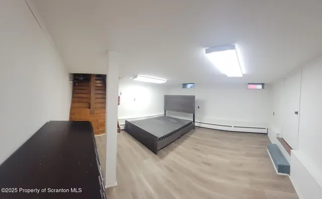 a view of an empty room and window