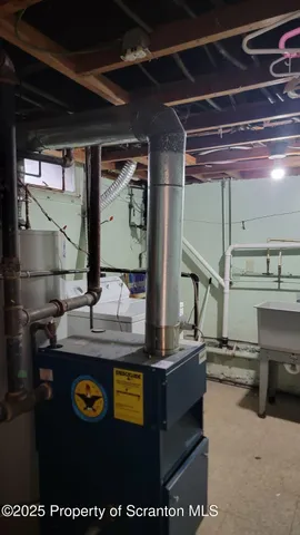 a view of kitchen with utility room