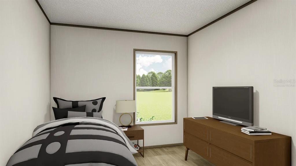 33242 Forest Ridge Road DeLand, FL 32720 - Photo 11 of 15 a bedroom with a bed and large windows