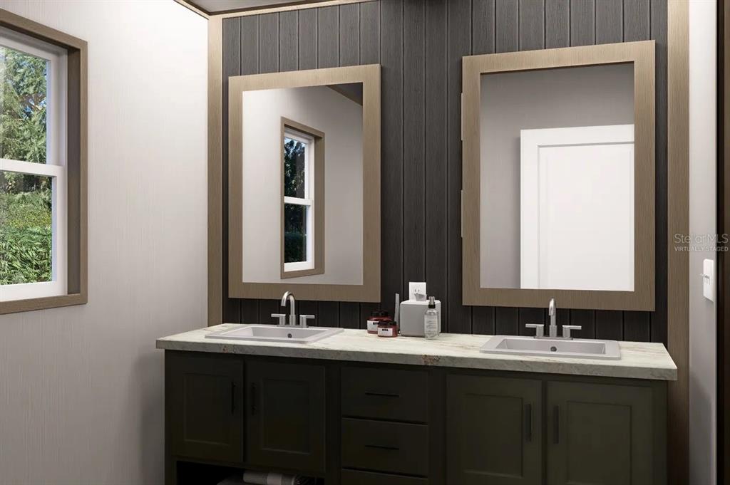 33242 Forest Ridge Road DeLand, FL 32720 - Photo 8 of 15 a bathroom with double sink and a mirror
