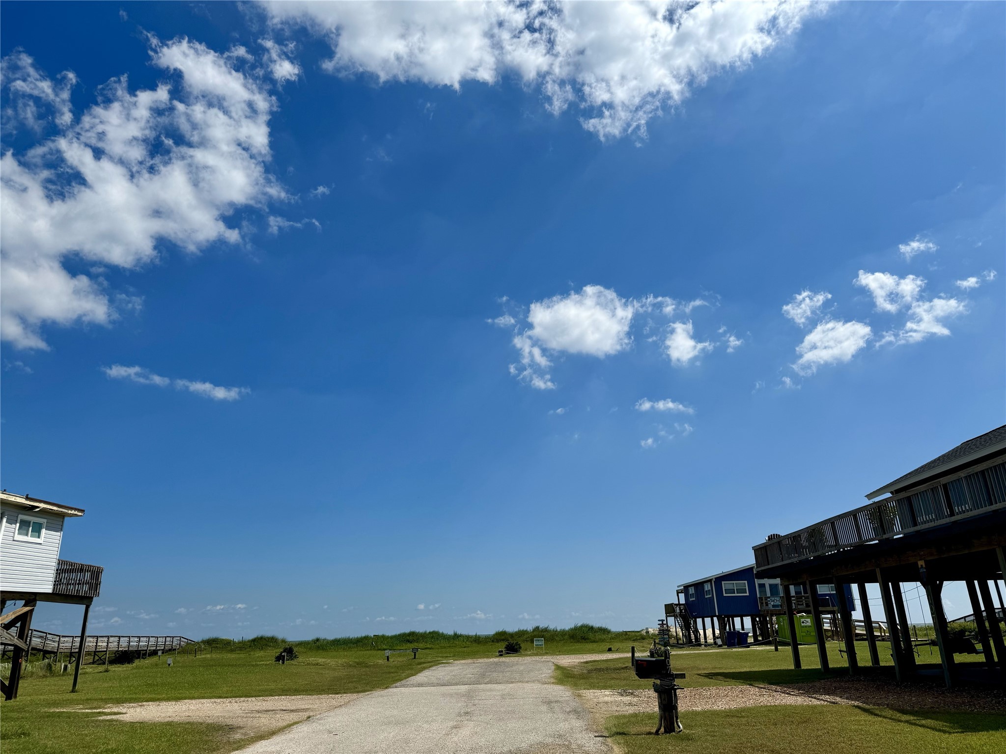118 Nesmith Place Surfside Beach, TX 77541 - Photo 6 of 6 Beachside of the highway and steps to the ocean.