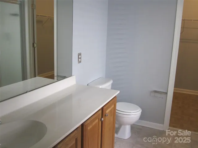 a bathroom with a toilet and a sink