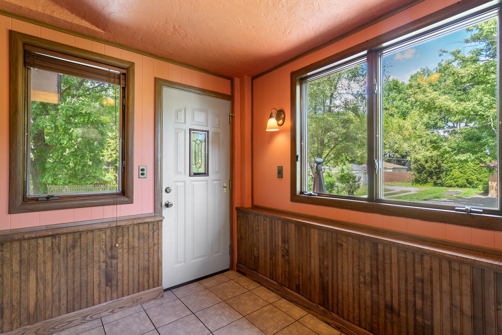 342 Lawton Road Riverside, IL 60546 - Photo 23 of 33 a view of a house that has a large window