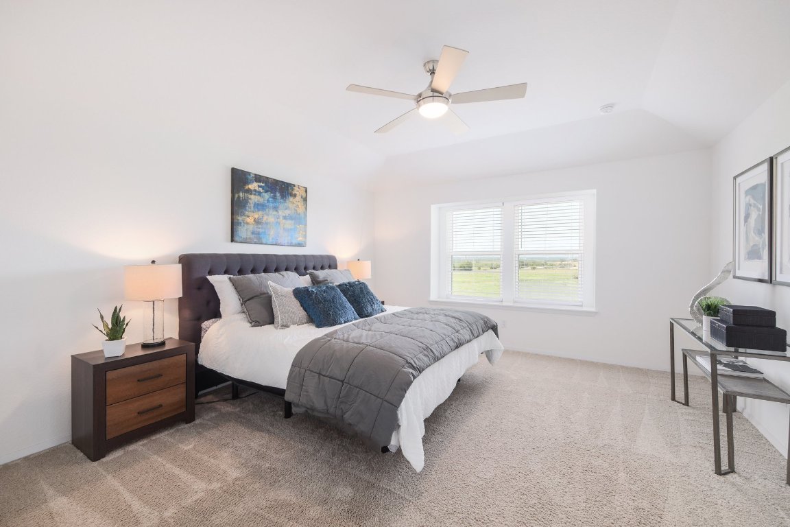 1408 Flint Knapper Drive Georgetown, TX 78626 - Photo 19 of 32 a spacious bedroom with a bed and window