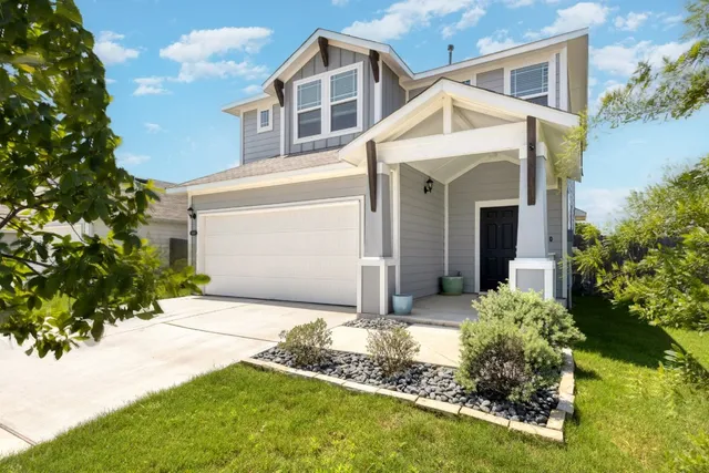 a front view of house with yard
