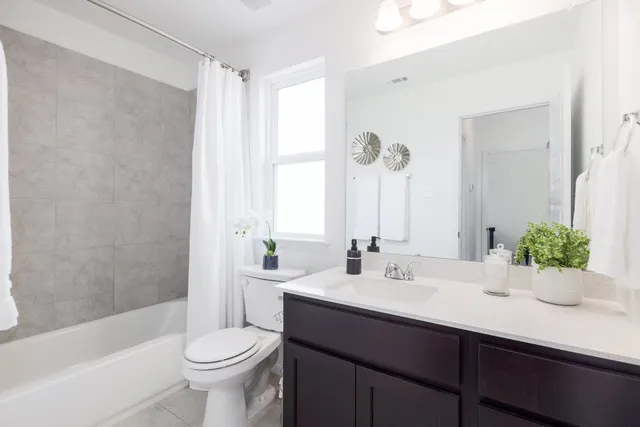 a bathroom with a sink and a shower