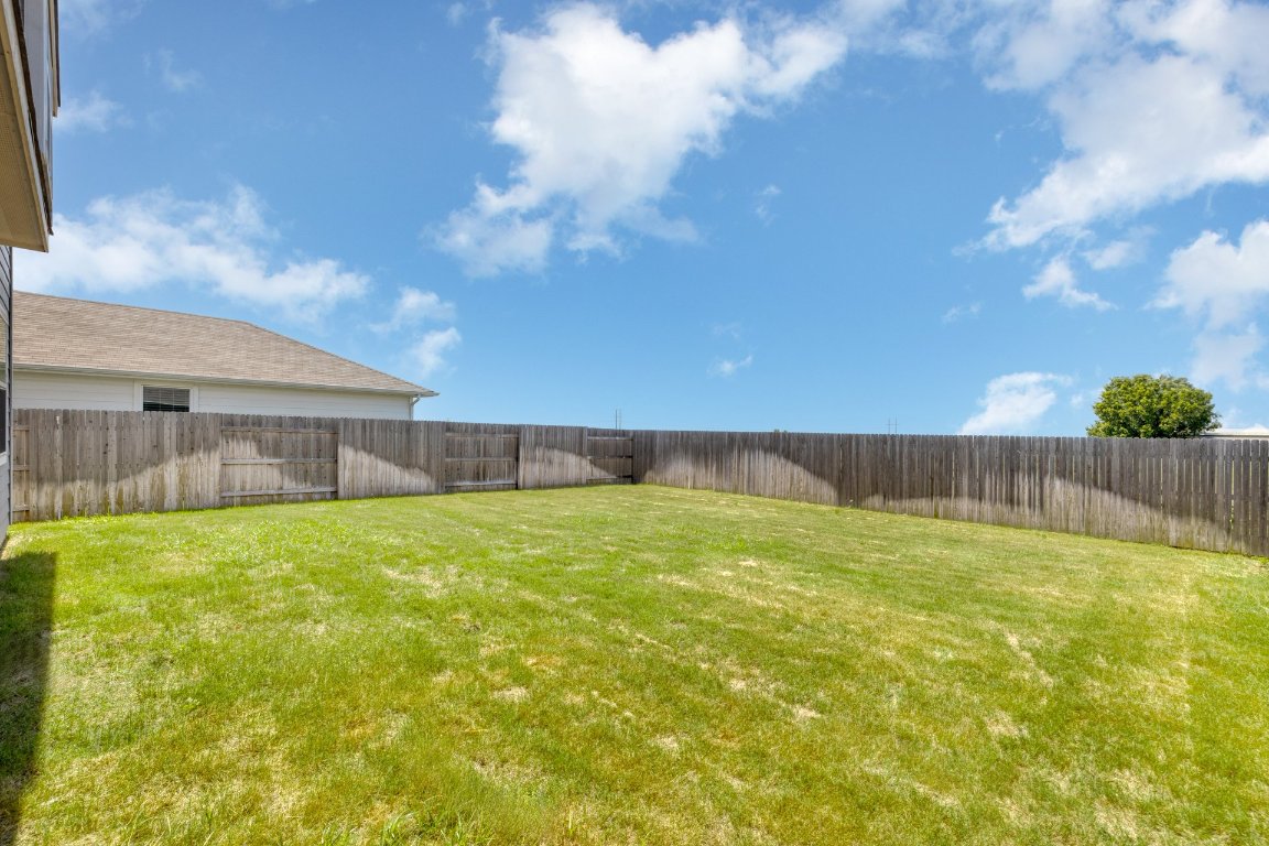 1408 Flint Knapper Drive Georgetown, TX 78626 - Photo 29 of 32 a view of a backyard
