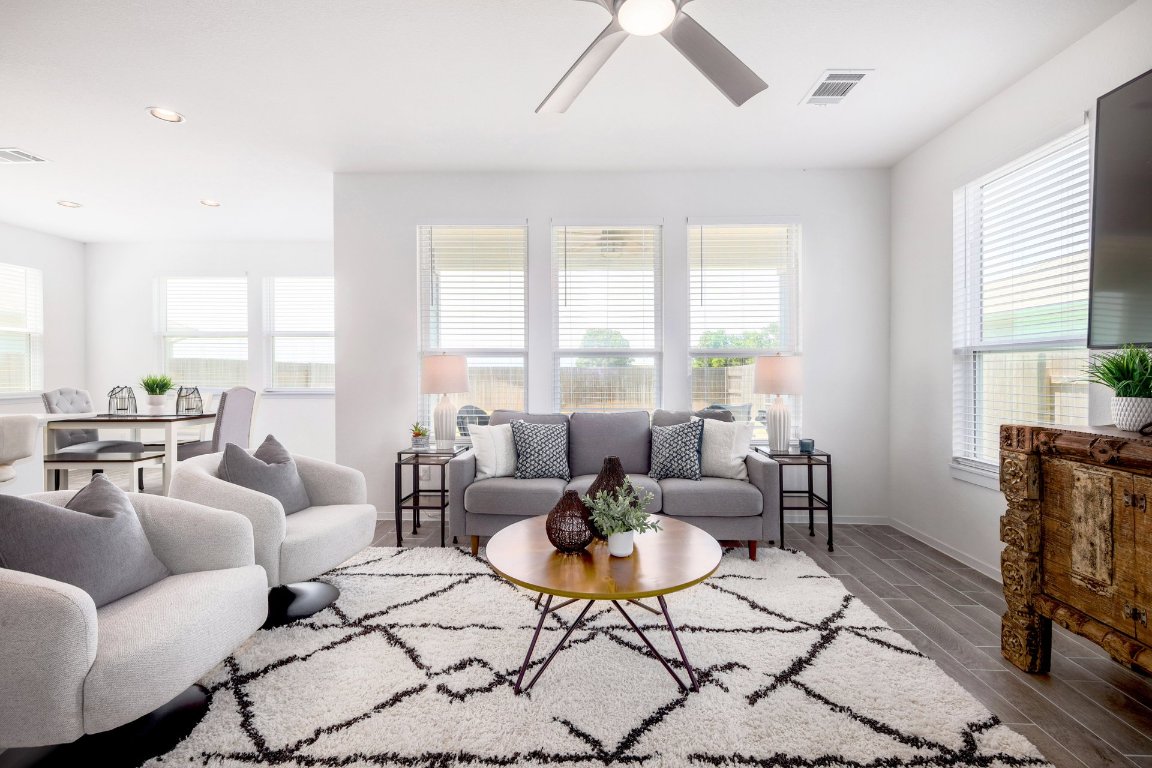 1408 Flint Knapper Drive Georgetown, TX 78626 - Photo 9 of 32 a living room with furniture and a large window