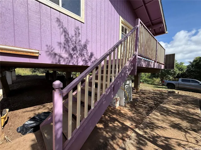 a view of a dining room with furniture and window
