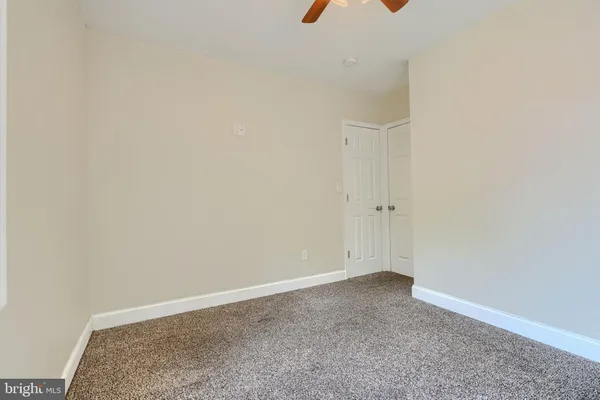 an empty room with an entryway