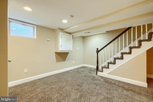 an empty room with a hallway