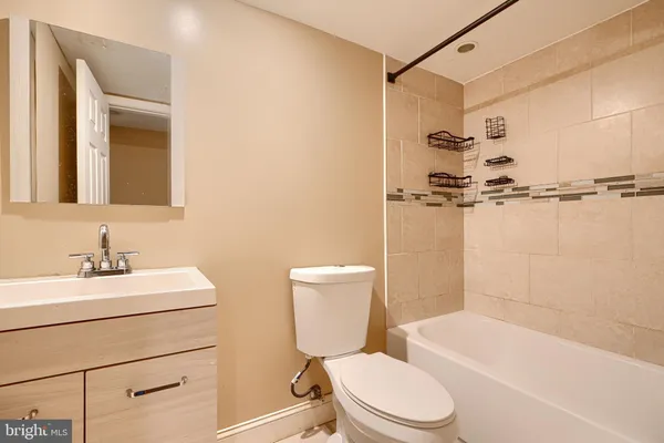 a bathroom with a white bath tub