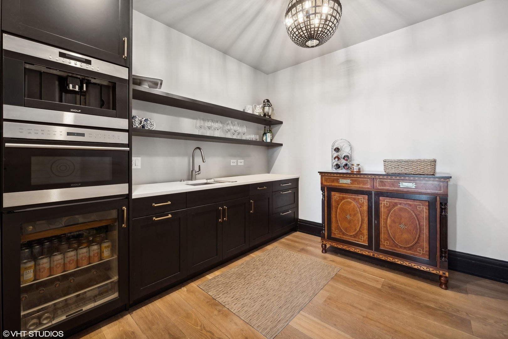 1109 West Washington Boulevard, Unit 6D Chicago, IL 60607 - Photo 23 of 41 a kitchen with stainless steel appliances granite countertop a stove and a microwave