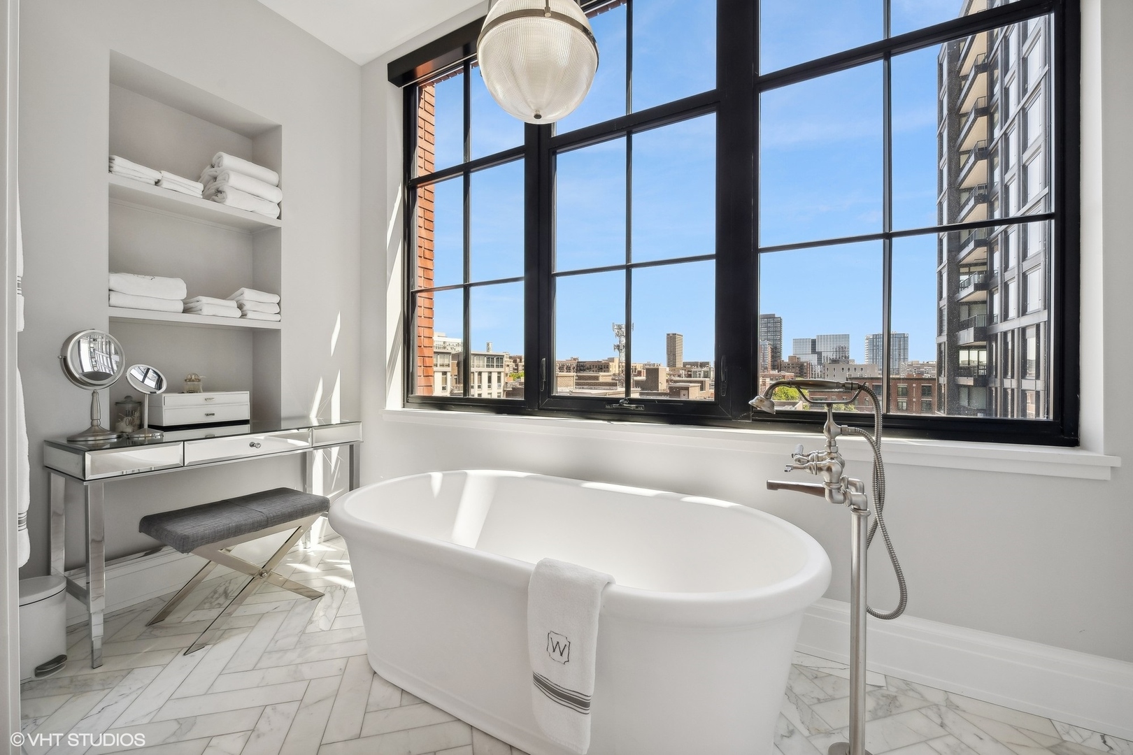 1109 West Washington Boulevard, Unit 6D Chicago, IL 60607 - Photo 34 of 41 a bath tub sitting next to a window
