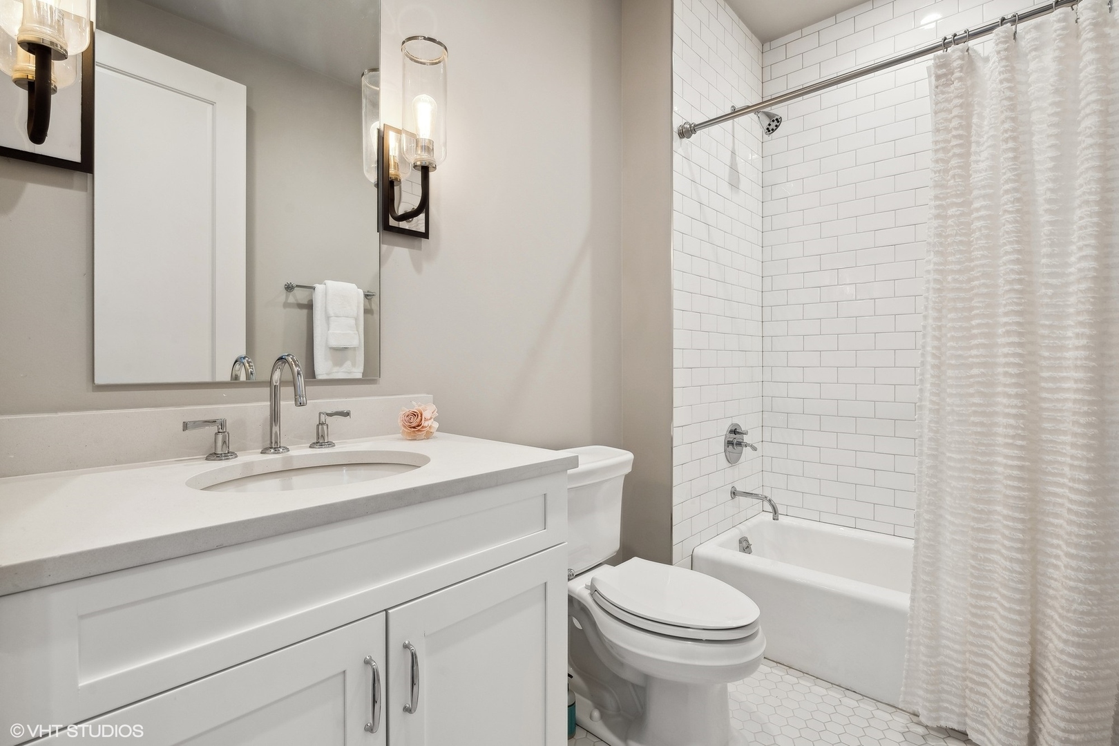 1109 West Washington Boulevard, Unit 6D Chicago, IL 60607 - Photo 37 of 41 a bathroom with a sink toilet and shower