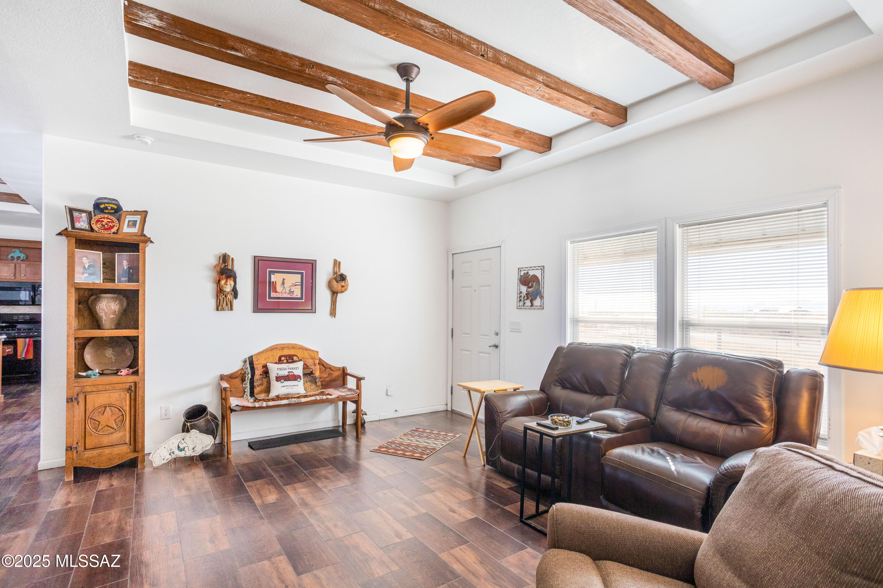 10187 North Mormon Road Elfrida, AZ 85610 - Photo 19 of 50 a living room with furniture and a wooden floor