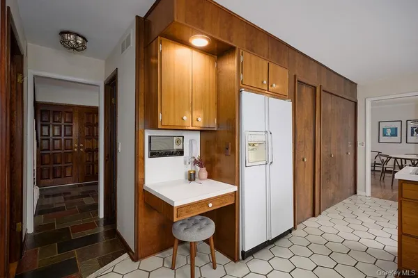 a bathroom with a sink and vanity