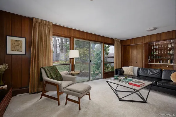 a bed room with a bed and a window
