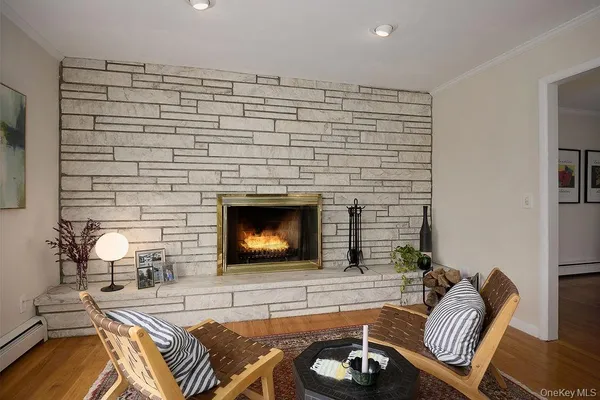 a bedroom with a bed and a fireplace