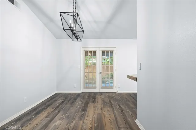 a view of empty room with windows