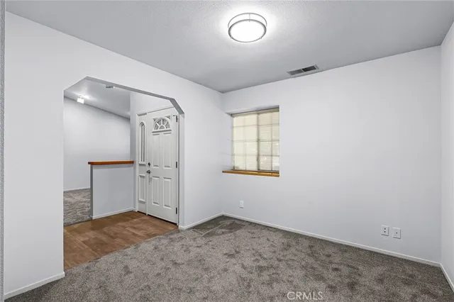 a bathroom with a shower and a toilet