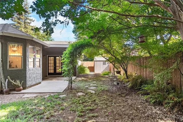 an aerial view of houses with yard