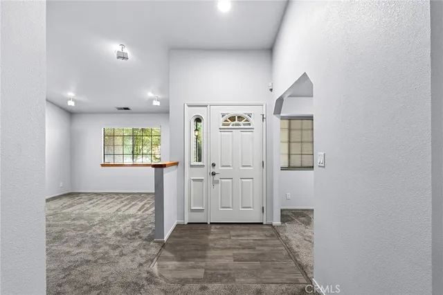 an empty room with windows