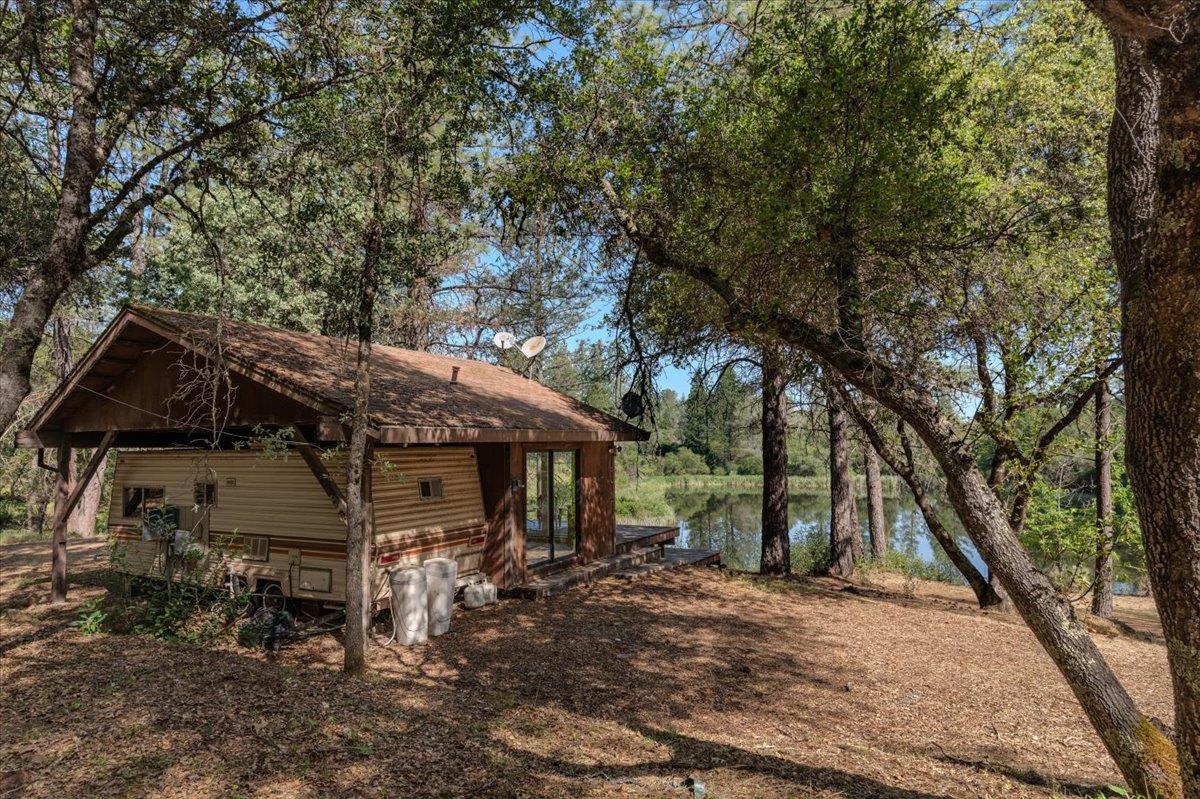 11076 Houghton Ranch Road Penn Valley, CA 95946 - Photo 23 of 41 a view of a house with a tree
