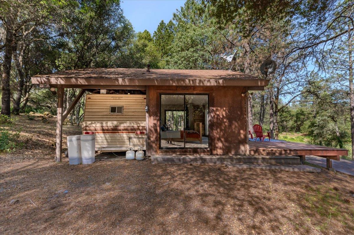 11076 Houghton Ranch Road Penn Valley, CA 95946 - Photo 39 of 41 a view of a car park in front of a house
