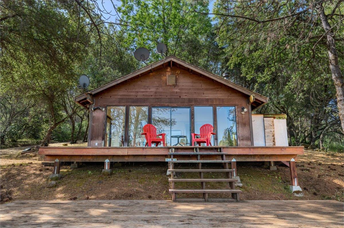 11076 Houghton Ranch Road Penn Valley, CA 95946 - Photo 40 of 41 a view of a chairs and table in a back yard