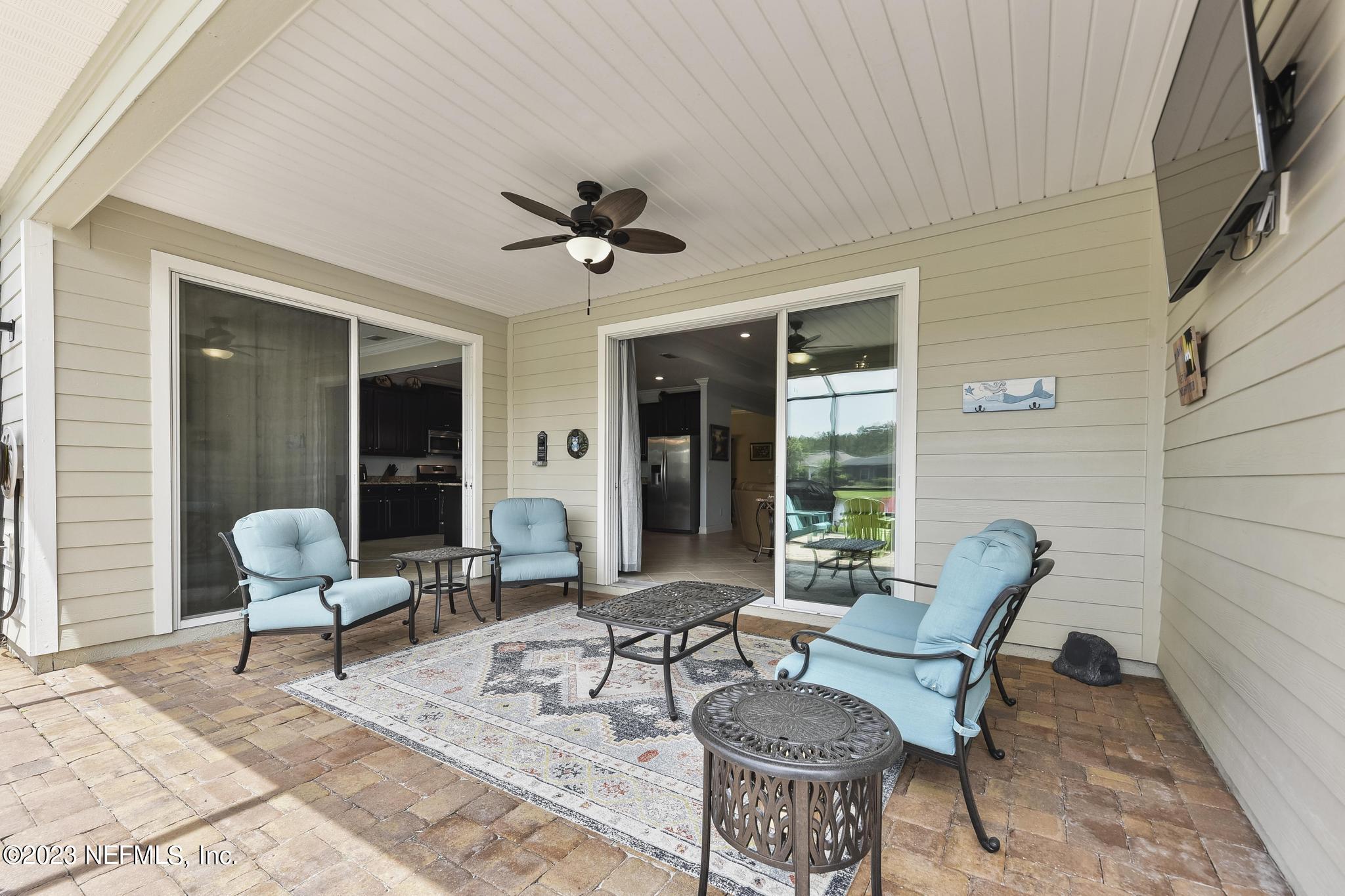 168 St Kitts Loop St. Augustine, FL 32092 - Photo 27 of 41 a living room with furniture and a window