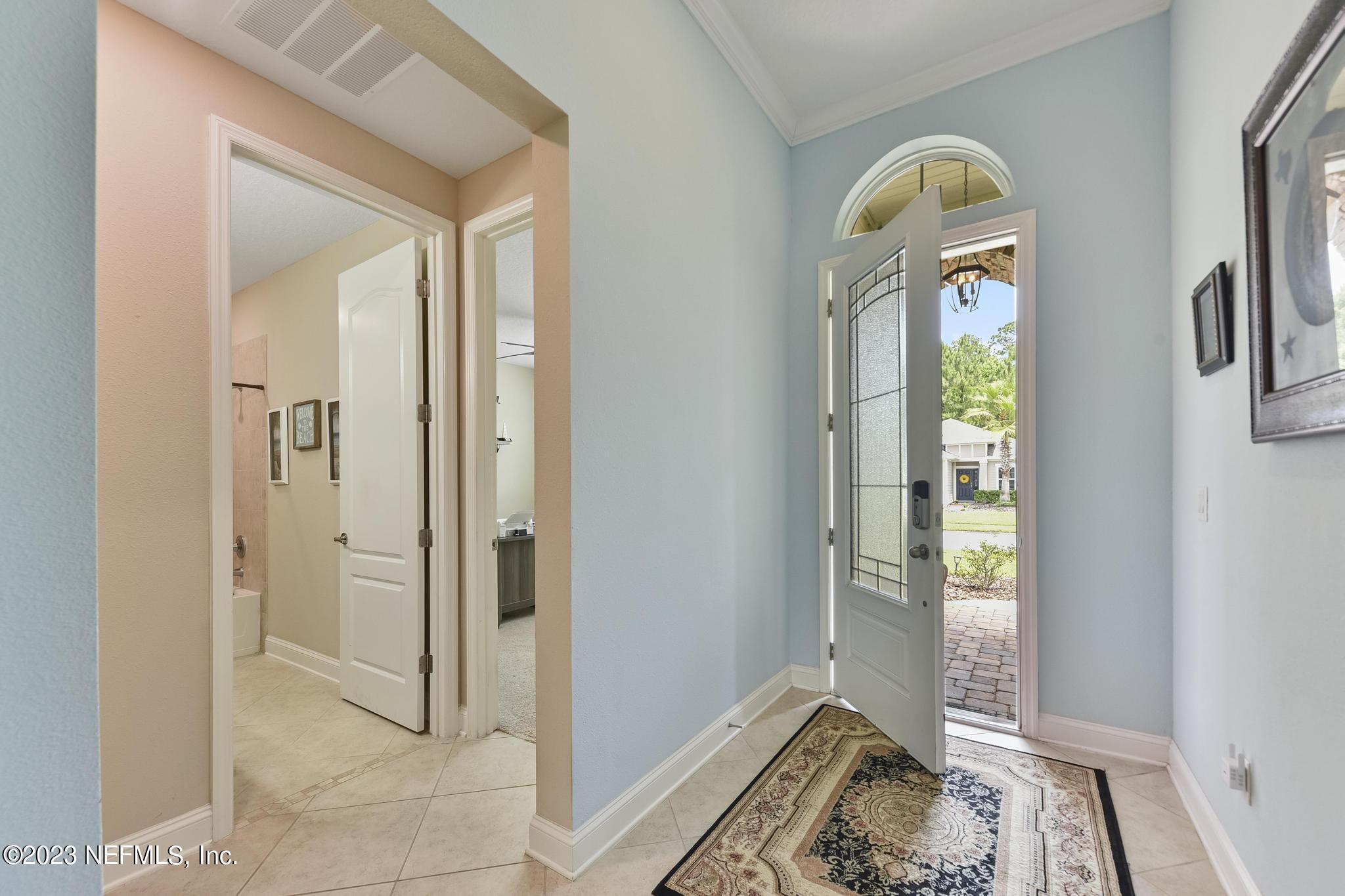 168 St Kitts Loop St. Augustine, FL 32092 - Photo 4 of 41 a view of bedroom with window