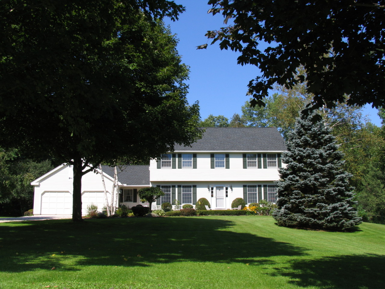 31 Old Barn Road Lenox, MA 01240 - Photo 1 of 56 a front view of a house with a garden