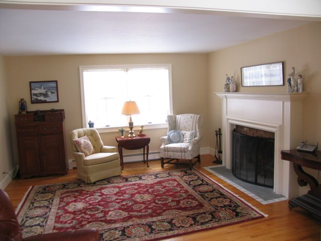 31 Old Barn Road Lenox, MA 01240 - Photo 11 of 56 a living room with furniture and a fireplace