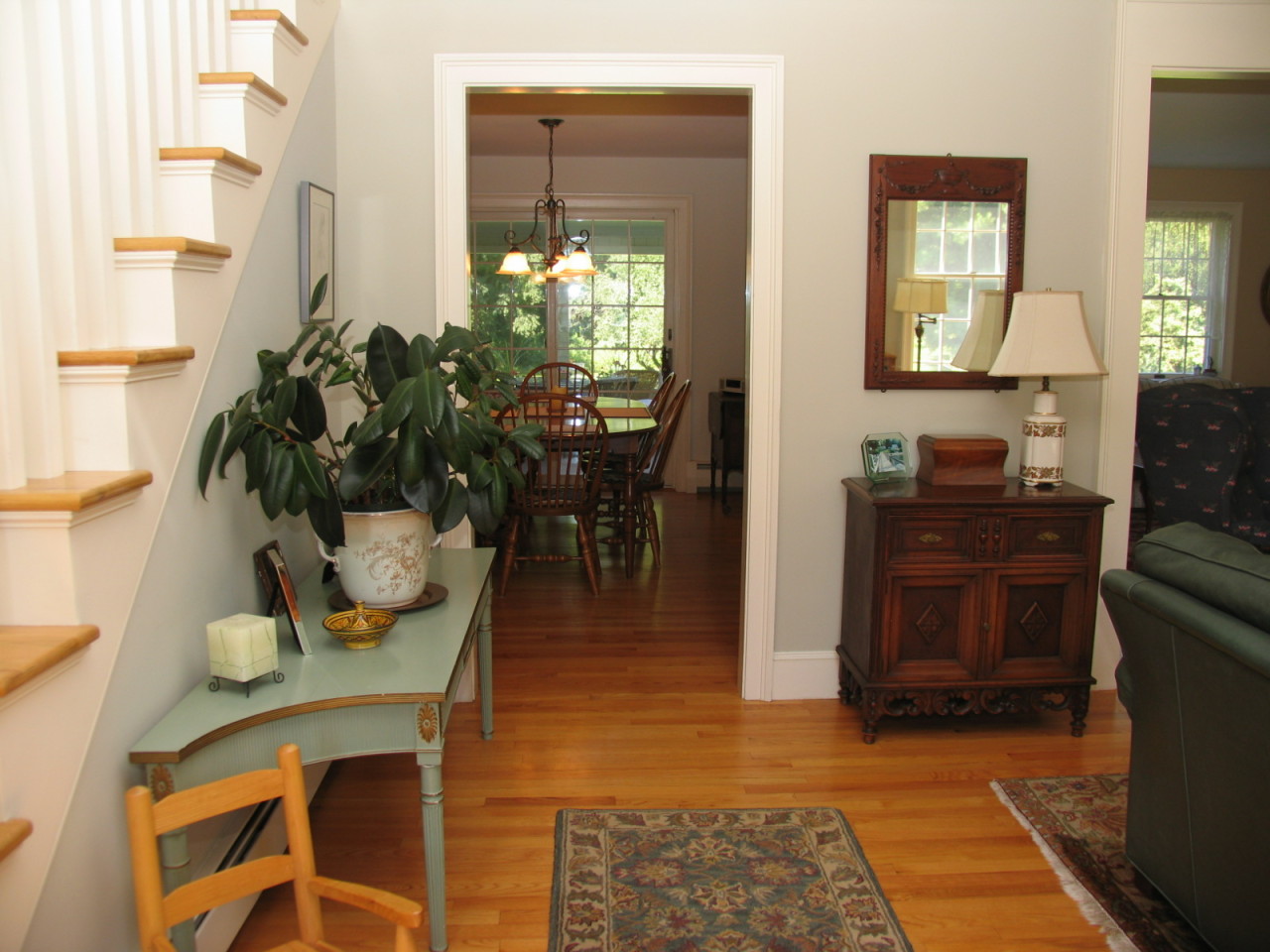 31 Old Barn Road Lenox, MA 01240 - Photo 13 of 56 a view of a dining room with furniture and a potted plant