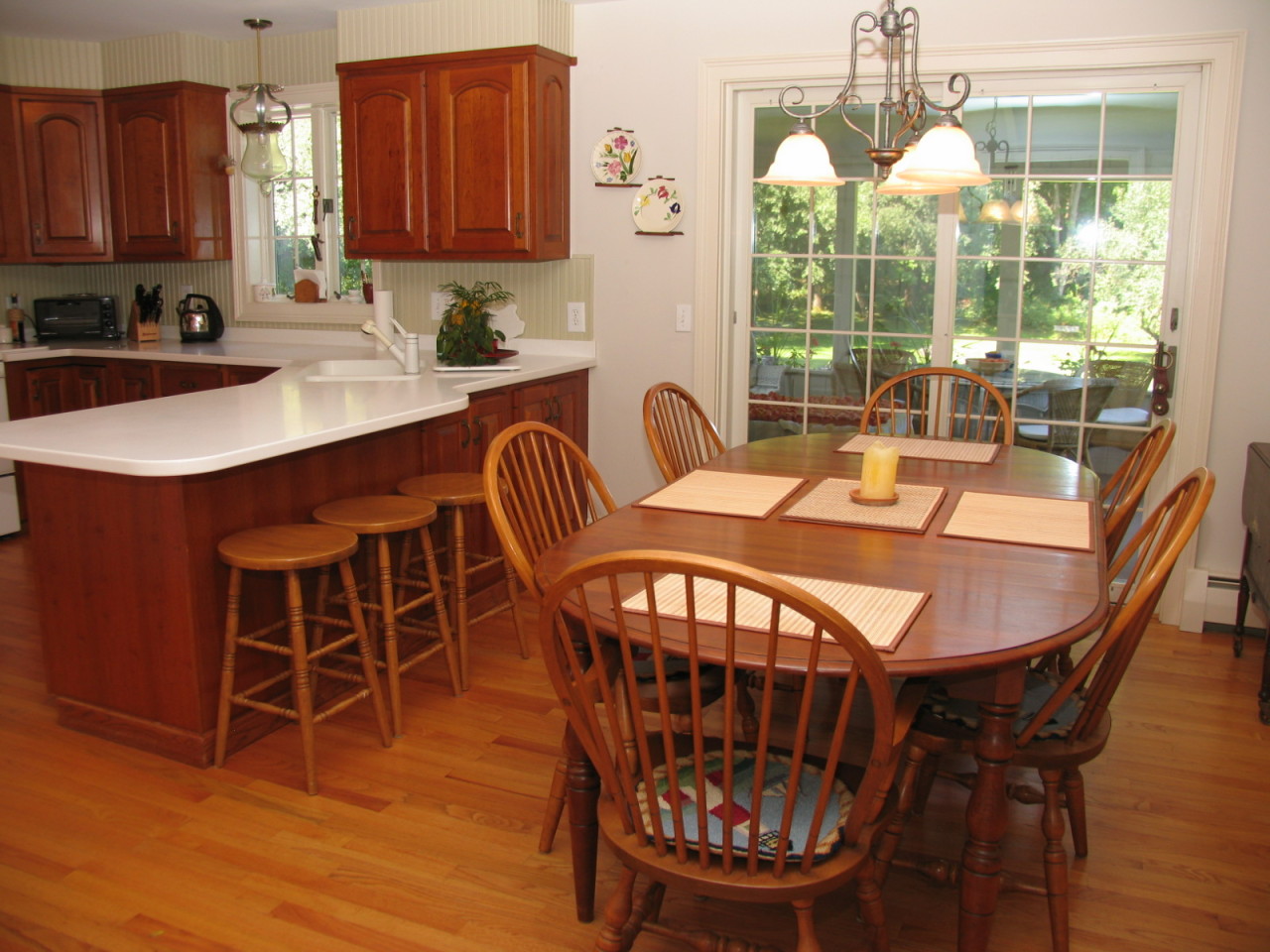 31 Old Barn Road Lenox, MA 01240 - Photo 17 of 56 a view of a dining room with furniture window and wooden floor
