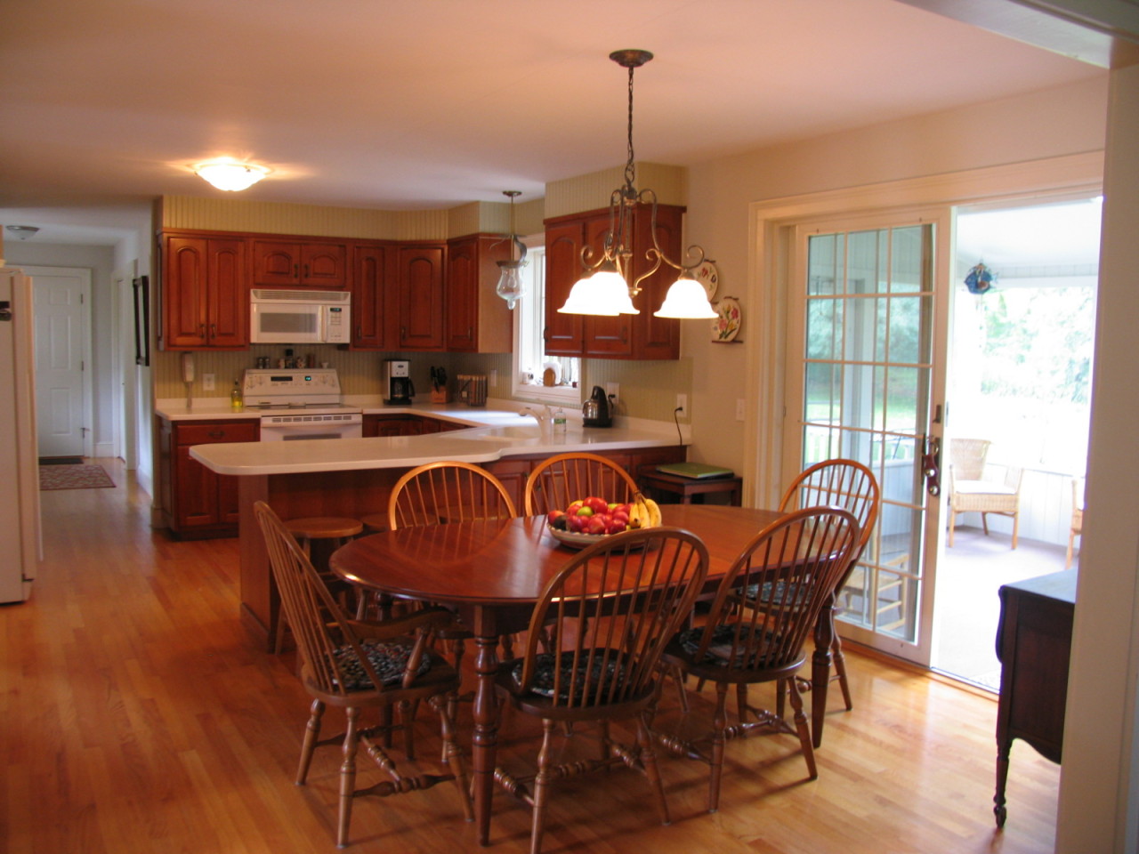 31 Old Barn Road Lenox, MA 01240 - Photo 21 of 56 a dining room with furniture a chandelier and wooden floor