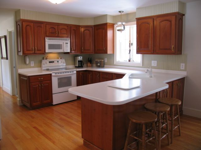 31 Old Barn Road Lenox, MA 01240 - Photo 23 of 56 a kitchen with a sink cabinets and wooden floor