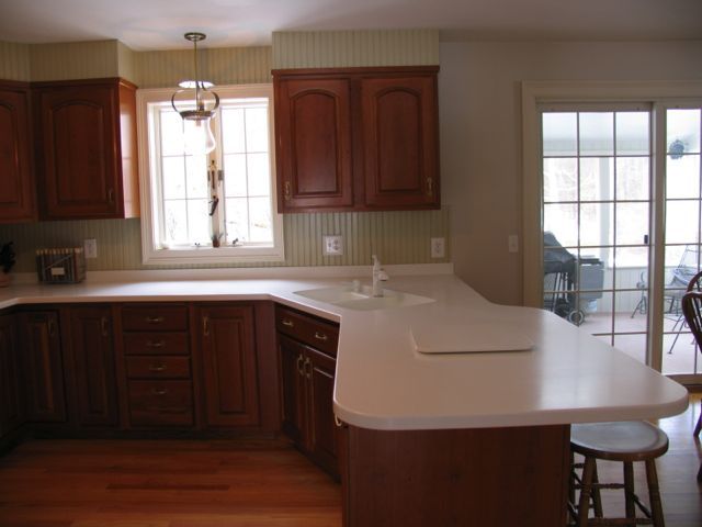 31 Old Barn Road Lenox, MA 01240 - Photo 26 of 56 a kitchen with a sink a window and cabinets
