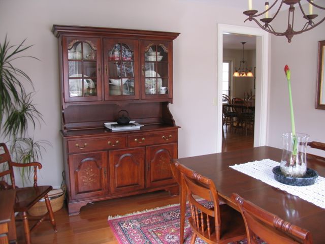 31 Old Barn Road Lenox, MA 01240 - Photo 31 of 56 a dining room with wooden floor table and chairs