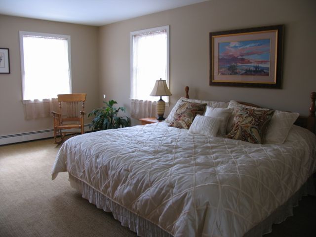 31 Old Barn Road Lenox, MA 01240 - Photo 44 of 56 a bedroom with a bed and window