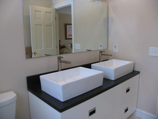 31 Old Barn Road Lenox, MA 01240 - Photo 49 of 56 a bathroom with a toilet sink and mirror