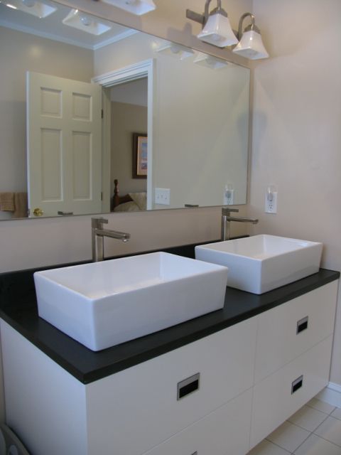 31 Old Barn Road Lenox, MA 01240 - Photo 50 of 56 a bathroom with a sink and a mirror