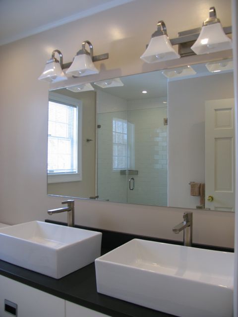 31 Old Barn Road Lenox, MA 01240 - Photo 51 of 56 a bathroom with a bathtub sink and mirror