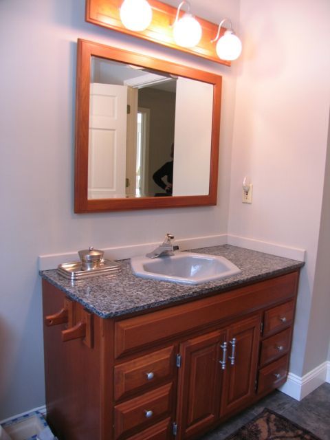 31 Old Barn Road Lenox, MA 01240 - Photo 53 of 56 a bathroom with a granite countertop sink and a mirror