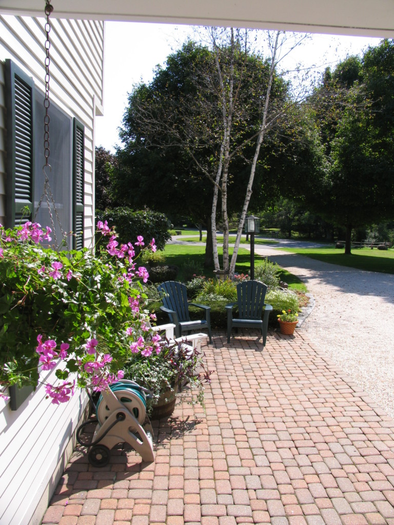31 Old Barn Road Lenox, MA 01240 - Photo 7 of 56 a bench is sitting in the middle of a yard