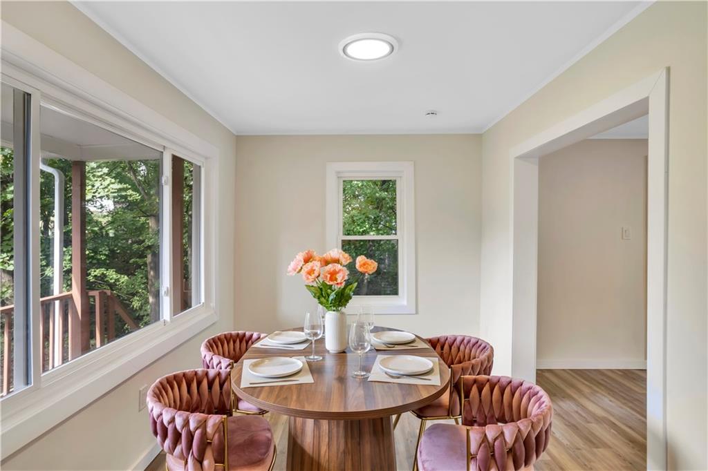 1430 Ridge Avenue Coraopolis, PA 15108 - Photo 11 of 32 a view of a dining room with furniture window and outside view