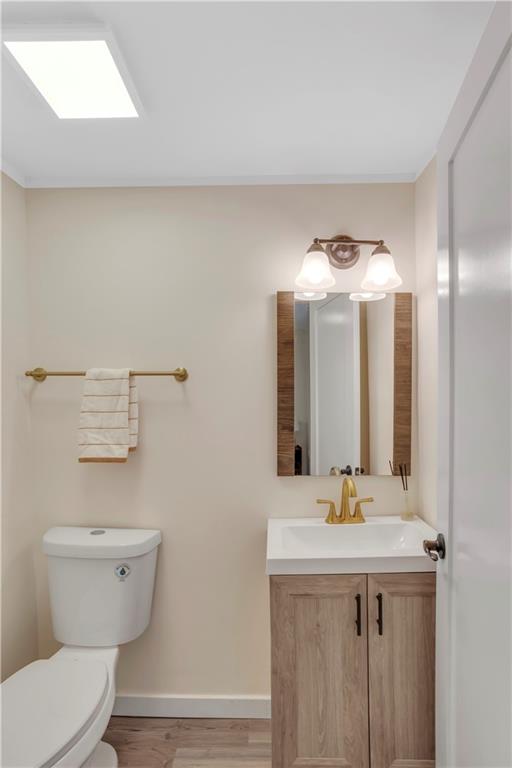 1430 Ridge Avenue Coraopolis, PA 15108 - Photo 24 of 32 a bathroom with a toilet a sink and mirror